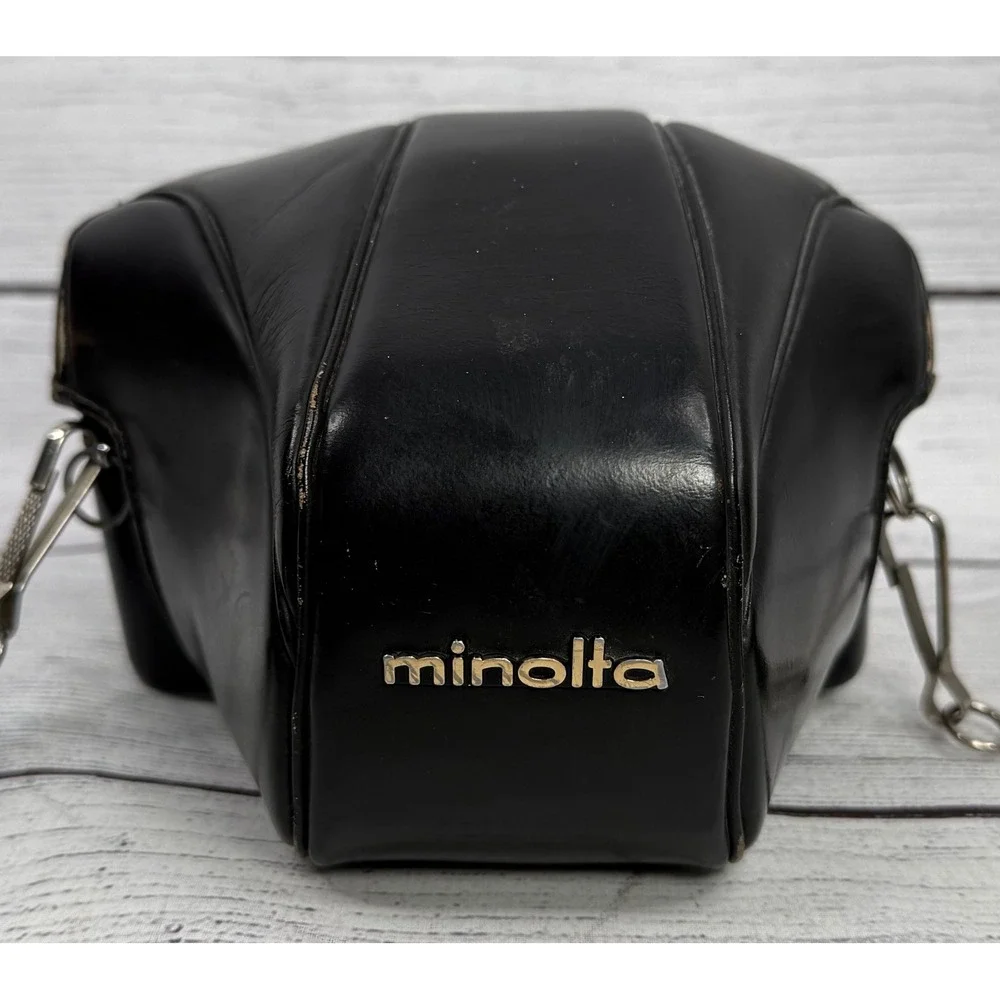 Minolta SRT 101‎ 35mm SLR Film Camera with MC Rokkor-PF 55mm f1.7 Lens Silver